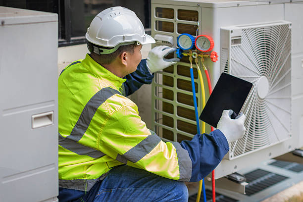 Professional Hvac technician working in Thrall, TX